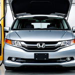 A professional mechanic, fully clothed in work attire, performing an oil change on a Honda Odyssey in a clean garage. Safe for work, appropriate content, perfect anatomy, professional setting.